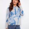 Blue abstract printed hoodie sweater featuring a hood with drawstrings, creating a casual look by Charlie B.