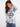 Stylish long-sleeve sweater featuring elegant side buttons and a unique abstract design by Charlie B.