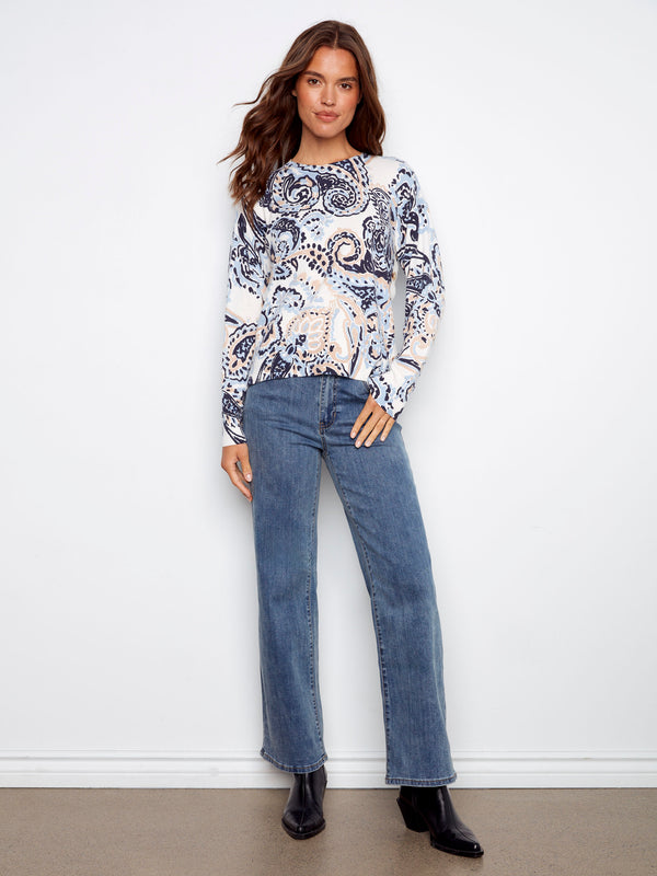 Elegant ribbed neck and hem add texture to this beautiful Rococo print sweater by Charlie B.