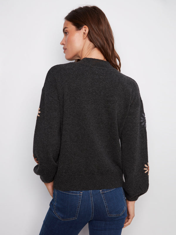 Stylish heather charcoal sweater adorned with floral details, featuring a relaxed drop shoulder fit by Charlie B.