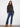 Heather charcoal sweater showcasing floral embroidery, complete with elastic cuffs for comfort by Charlie B.