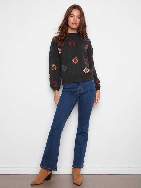 Heather charcoal sweater showcasing floral embroidery, complete with elastic cuffs for comfort by Charlie B.
