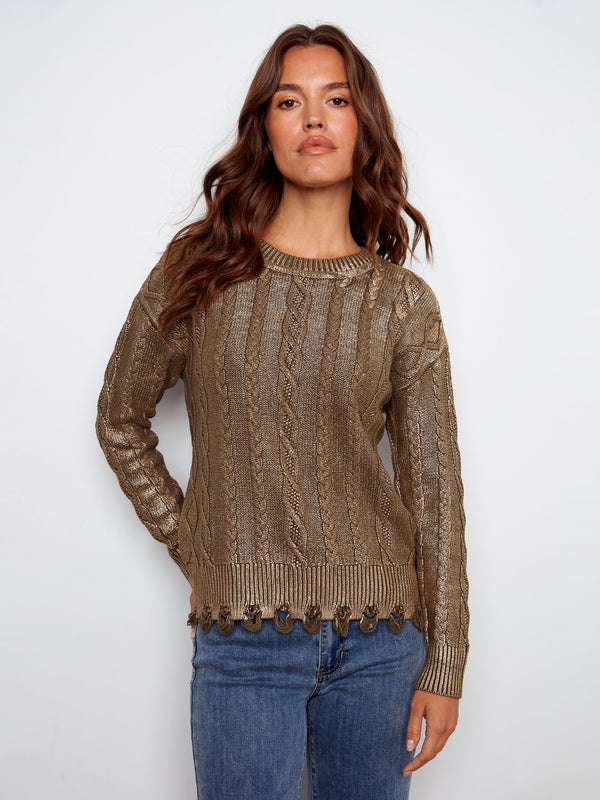 Cable knit sweater featuring a metallic finish in spruce, perfect for adding shine to your wardrobe. By Charlie B.