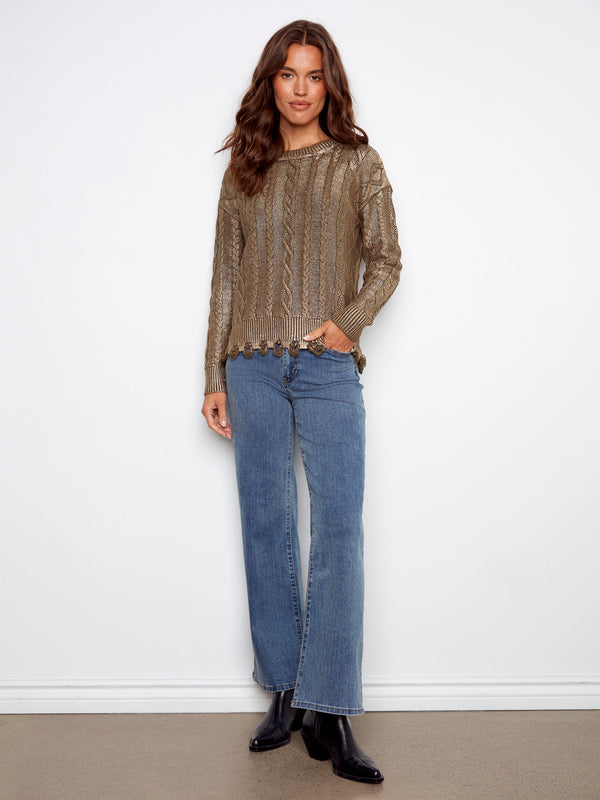 100% cotton cable knit sweater in spruce with elegant detailing, ideal for comfort and style. By Charlie B.