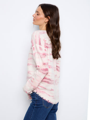 Drop shoulders lend a relaxed fit to this charming sweater, ideal for casual outings or cozy days at home. Fashioned superbly by Charlie B.