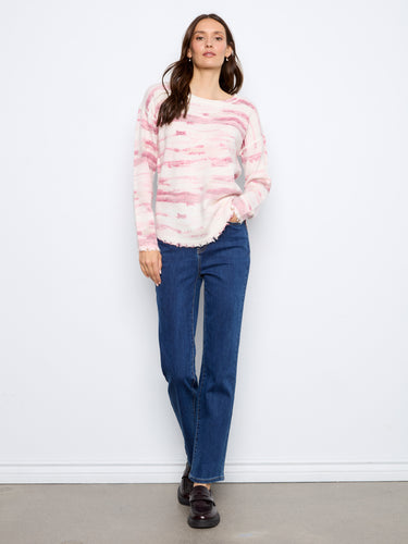 Showcasing a reversible design, this sweater offers versatile style options for any occasion. Elegantly designed by Charlie B.