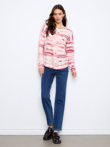 With its unique drop shoulders, this sweater provides an effortlessly chic silhouette. A must-have piece by Charlie B.