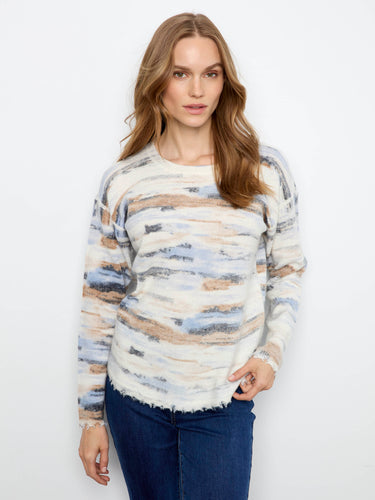 Featuring a plush knit texture, this sweater offers a cozy feel with its soft fabric and relaxed fit. By Charlie B.