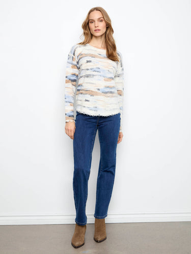 The drop shoulders provide a relaxed silhouette, enhancing the casual yet chic look of this sweater. By Charlie B.