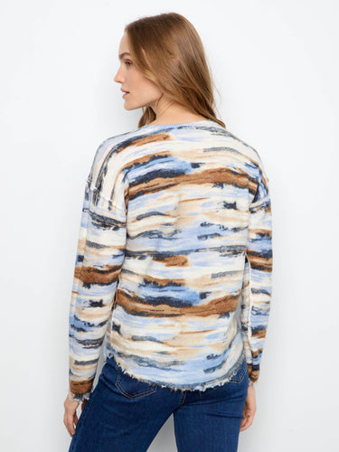 Enjoy the plush knit's comfort and warmth in cooler weather while maintaining effortless style. By Charlie B.