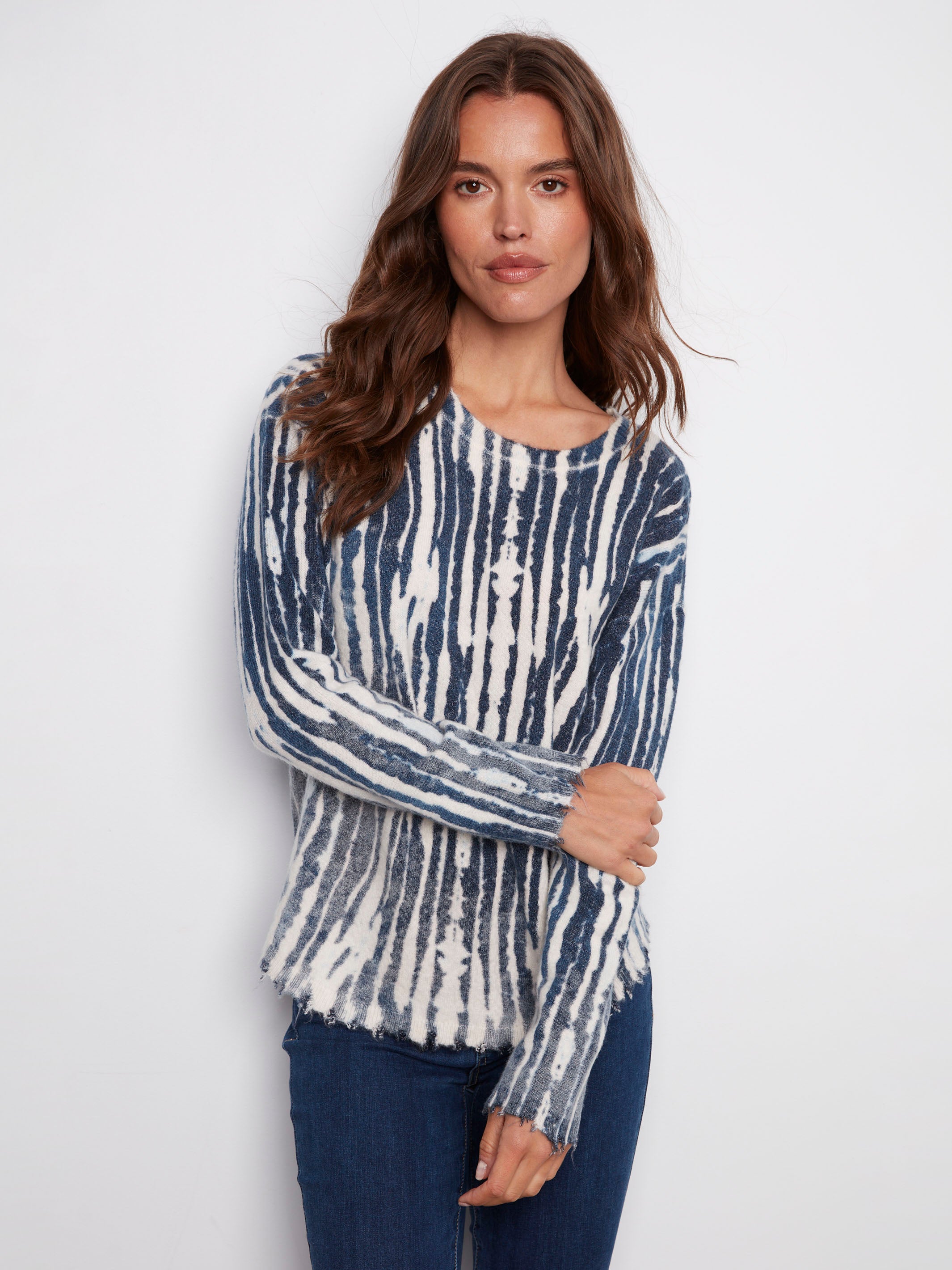 Blue and white abstract printed sweater with a cozy plush texture, offering both style and comfort by Charlie B.