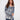 Blue and white abstract printed sweater with a cozy plush texture, offering both style and comfort by Charlie B.