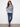 Cozy plush sweater in blue and white with a classic crew neckline that enhances its timeless appeal by Charlie B.