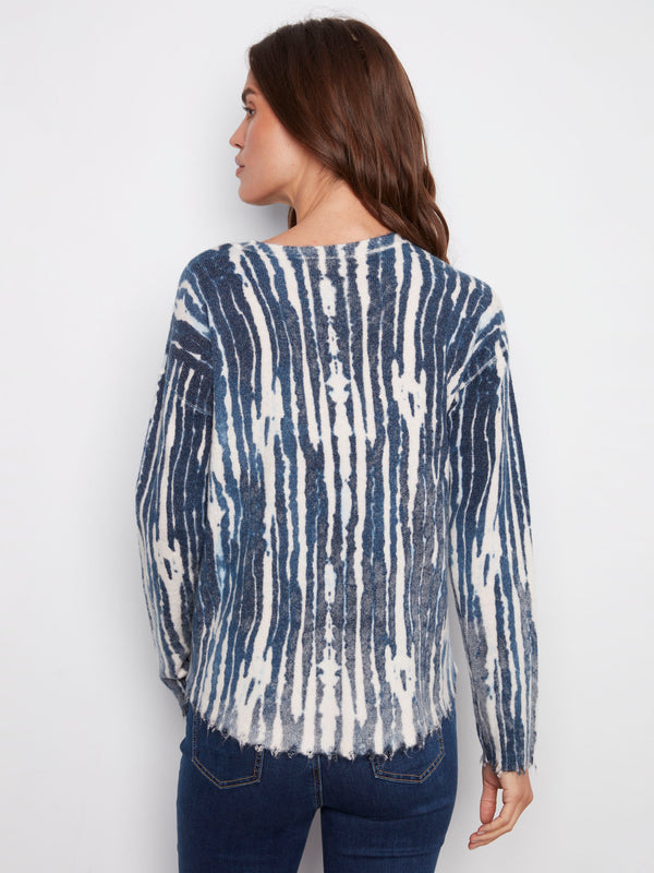 Elegant abstract print on this plush sweater highlights its unique reversible design by Charlie B.