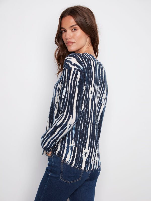 Chic blue and white printed sweater featuring drop shoulders, adding a relaxed vibe to your outfit by Charlie B.