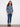 Elegant calico blue sweater with ribbed sleeves and intricate floral patterns by Charlie B.