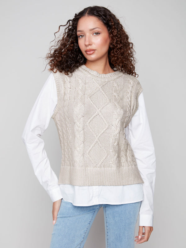 Elegant sleeveless sweater vest with a foiled cable knit pattern, showcasing a classic crew neck style by Charlie B.