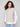 Stylish cable knit sweater vest in gold foil, featuring intricate patterns and timeless appeal by Charlie B.