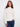 Ecru jacquard sweater featuring a mock neck and ribbed hem, highlighted by subtle metallic detail. Perfect for winter outings by Charlie B.