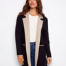 Black cardigan featuring a stylish contrast interior and elegant patch pockets by Charlie B.