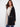 Chic black cardigan with intricate blanket stitch detail adding a unique touch by Charlie B.