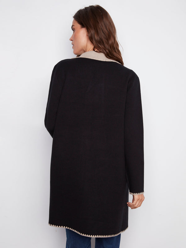 Elegant black cardigan designed with practical patch pockets for added convenience by Charlie B.
