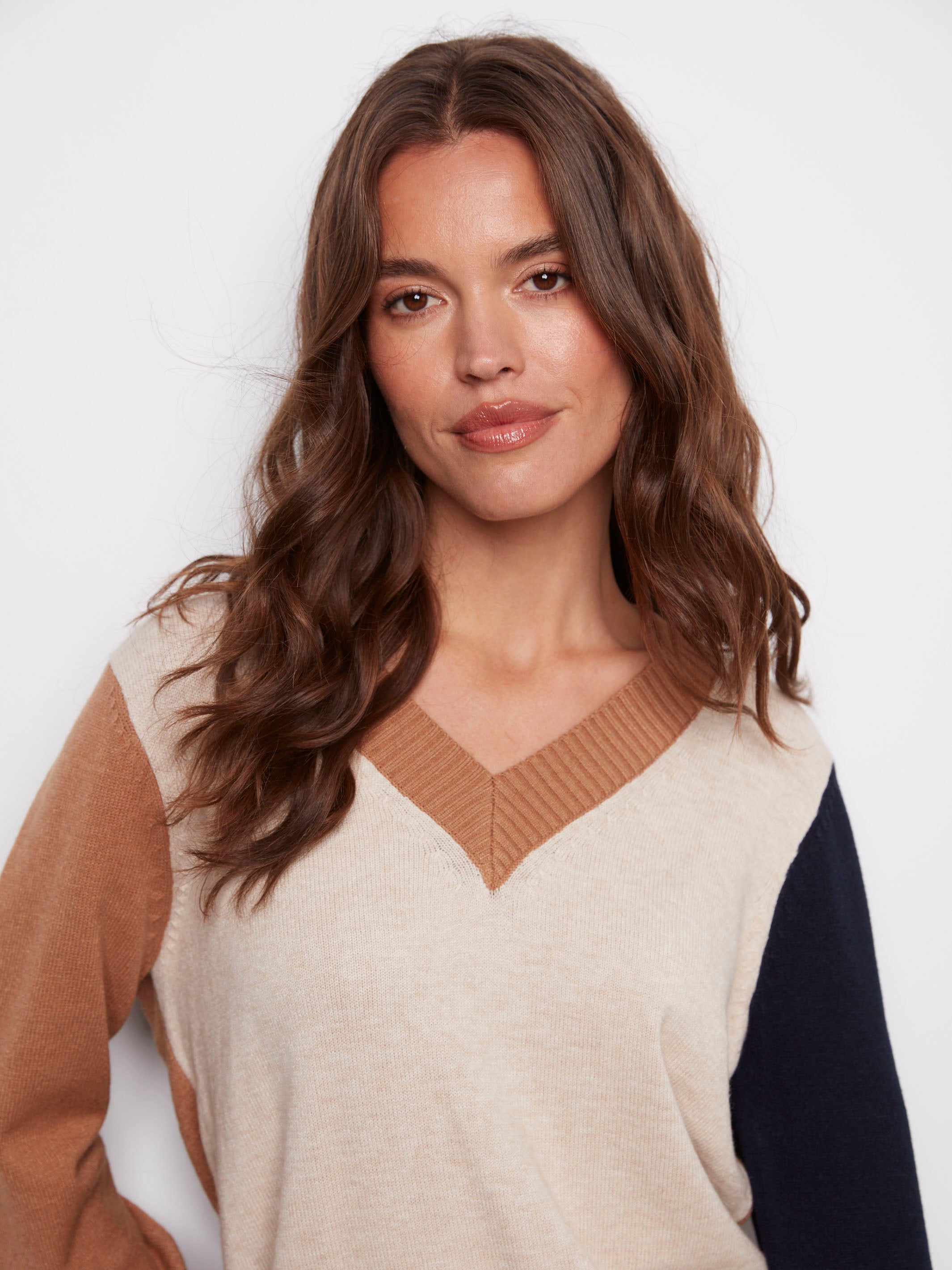 Fashion-forward colorblock design adds a modern touch to any outfit by Charlie B.