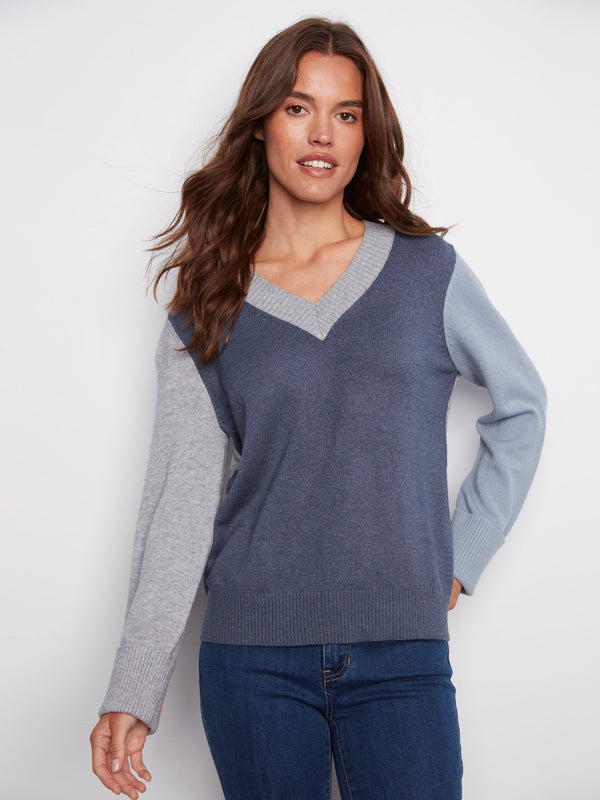Stylish V-neck sweater featuring a moonlight colorblock pattern, perfect for any casual outing by Charlie B.
