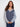Casual yet sophisticated, this V-neck sweater showcases wide cuffs and contrasting colors by Charlie B.
