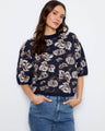 Floral patterned top with a mock neck, offering a chic and modern touch for any casual outing by Charlie B.