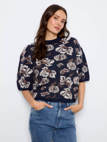 Floral patterned top with a mock neck, offering a chic and modern touch for any casual outing by Charlie B.