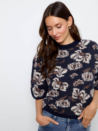 Soft brushed knit sweater featuring beautiful floral designs, perfect for cozy and stylish wear by Charlie B.