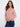 Heather primrose sweater showcasing stylish raglan sleeves, offering comfort and a relaxed fit for everyday wear by Charlie B.