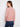 Stylish heather primrose sweater highlighting the crew neck feature, ideal for layering or wearing alone by Charlie B.