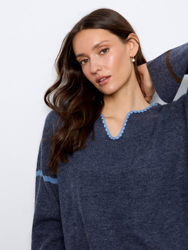 With its drop shoulders, this sweater offers a relaxed fit that combines comfort with modern style by Charlie B.