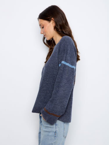 Enjoy the luxurious feel of the ribbed knit texture in this chic and versatile sweater, perfect for layering by Charlie B.