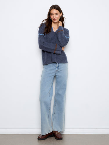 Long wide sleeves provide an extra element of coziness and style in this beautifully crafted sweater by Charlie B.