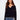 Navy sweater featuring drop shoulders and white embroidery detailing for a relaxed look by Charlie B.