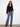 Relaxed fit navy sweater with notched neckline and detailed embroidery for a chic style by Charlie B.