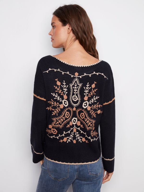 Back embroidery elevates the look of this relaxed-fit navy sweater, perfect for any occasion by Charlie B.