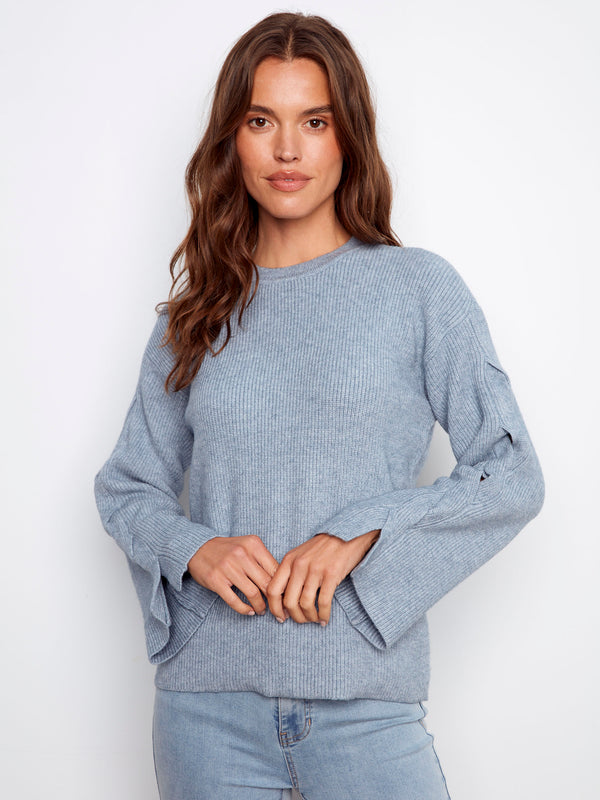 Denim sweater featuring a crew neck and stylish drop shoulders for a relaxed fit by Charlie B.