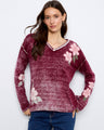 Merlot V-neck sweater with drop shoulders and floral accents, perfect for layering by Charlie B.