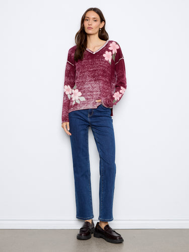Cotton blend V-neck sweater featuring vibrant floral print, offering comfort and style by Charlie B.