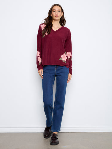 Stylish merlot sweater with drop shoulders and reversible floral pattern, adding flair to any outfit by Charlie B.
