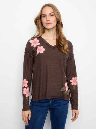 Showcasing its reversible print, this long-sleeve sweater provides versatile styling options for any occasion by Charlie B.