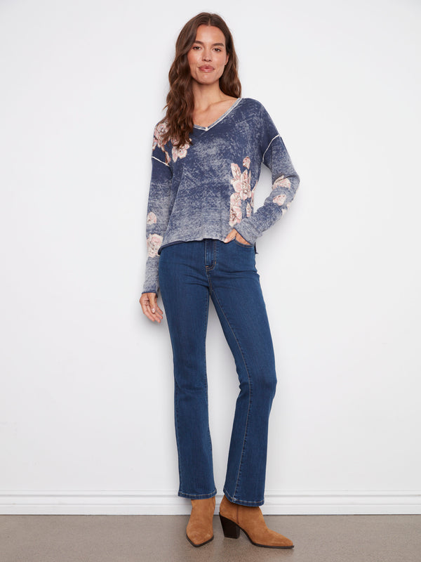 Reversible denim blue sweater featuring elegant floral prints and long sleeves for added warmth, by Charlie B.
