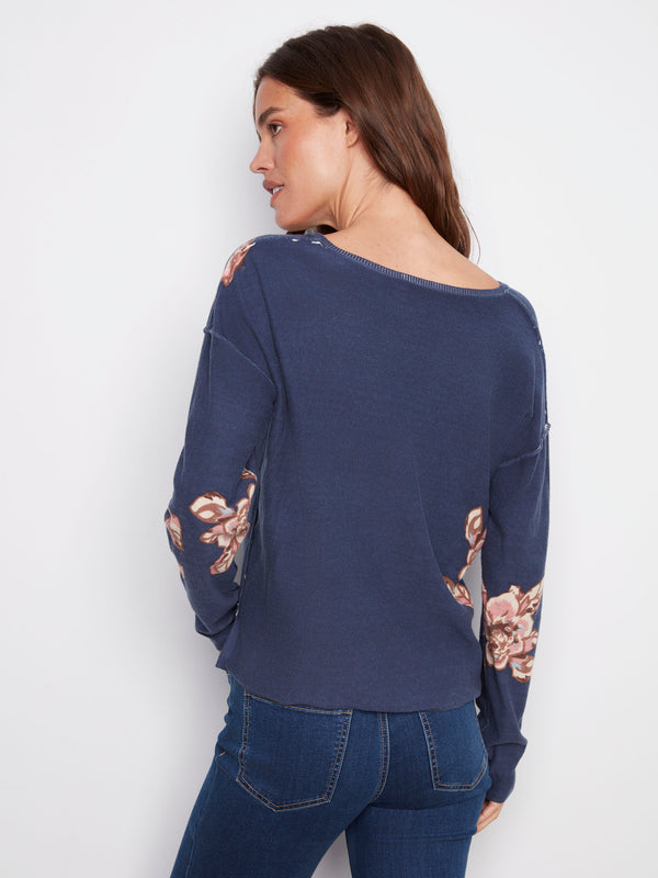 Stylish relaxed-fit sweater in denim blue featuring beautiful floral designs on the reversible side, by Charlie B.