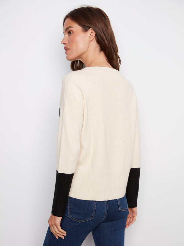 Crafted with a comfortable crew neck, this ecru sweater is both stylish and versatile for everyday wear by Charlie B.