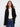Black cardigan featuring wide cuffs for a modern touch, perfect for layering and adding style to any outfit by Charlie B.