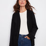 Black cardigan featuring wide cuffs for a modern touch, perfect for layering and adding style to any outfit by Charlie B.